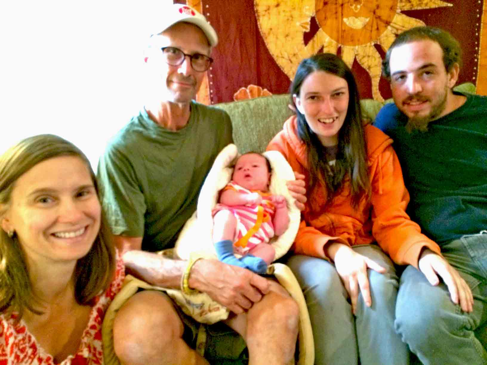An adoptee and both her adoptive parents and her biological parents